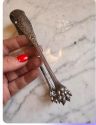 6 seporate forks Christofle and  sugar tongs