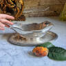 Sauce boat on a cast platter, England