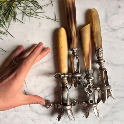 Meat clamp, cow horn and silverplate, France, 1920s, length 22 cm