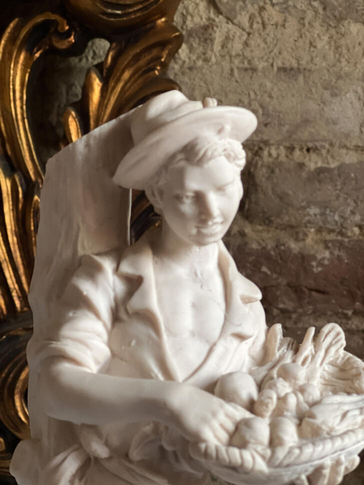 Porcelain figurine of a fruit vendor boy, Capodimonte style, height 33 cm, Italy, mid-20th century