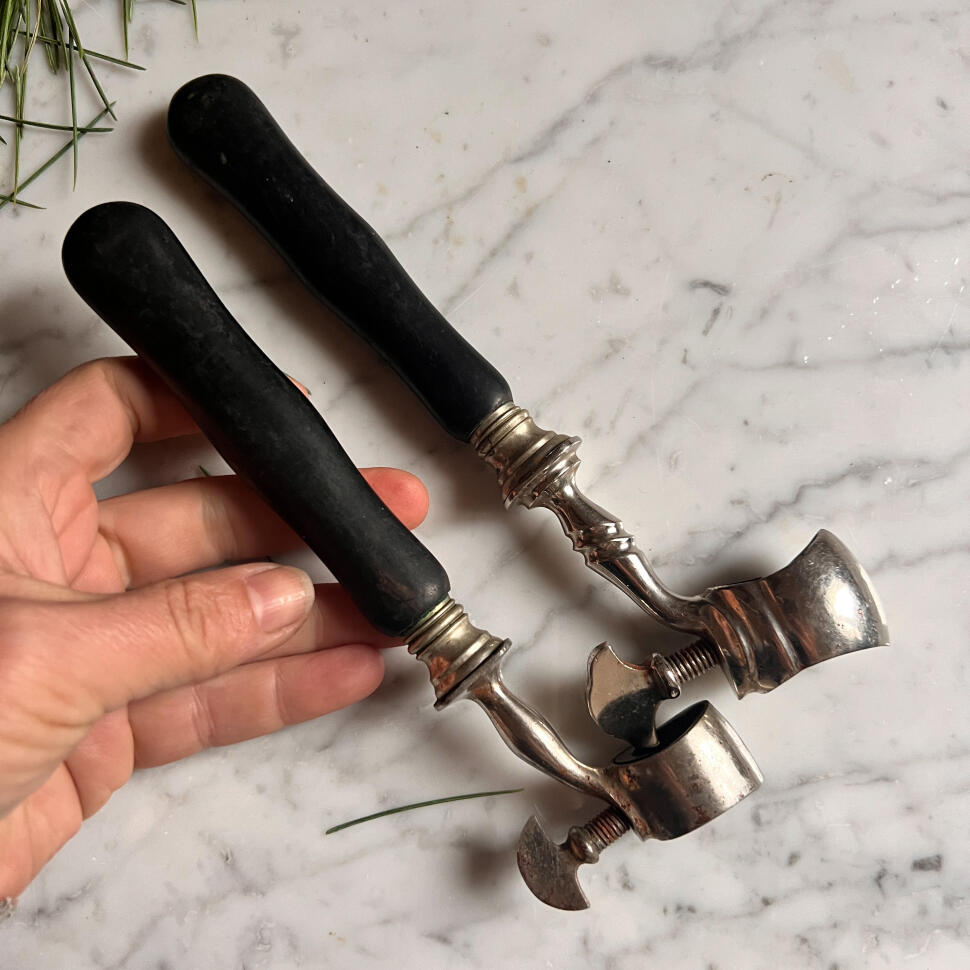 Meat clamps, black cow horn and silver-plated, France, 1900s, set of 2