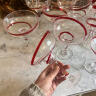 Set of 7 cocktail glasses, hand-blown, red vintage glasses with curls, Italy, 20th century.