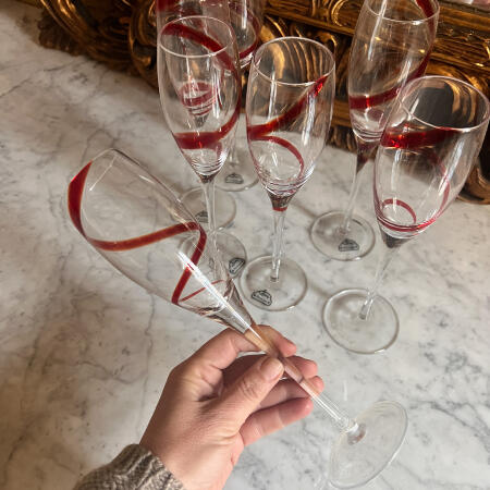 Set of 7 champagne glasses, hand blown, red vintage glasses with curls, Italy, 20th century.